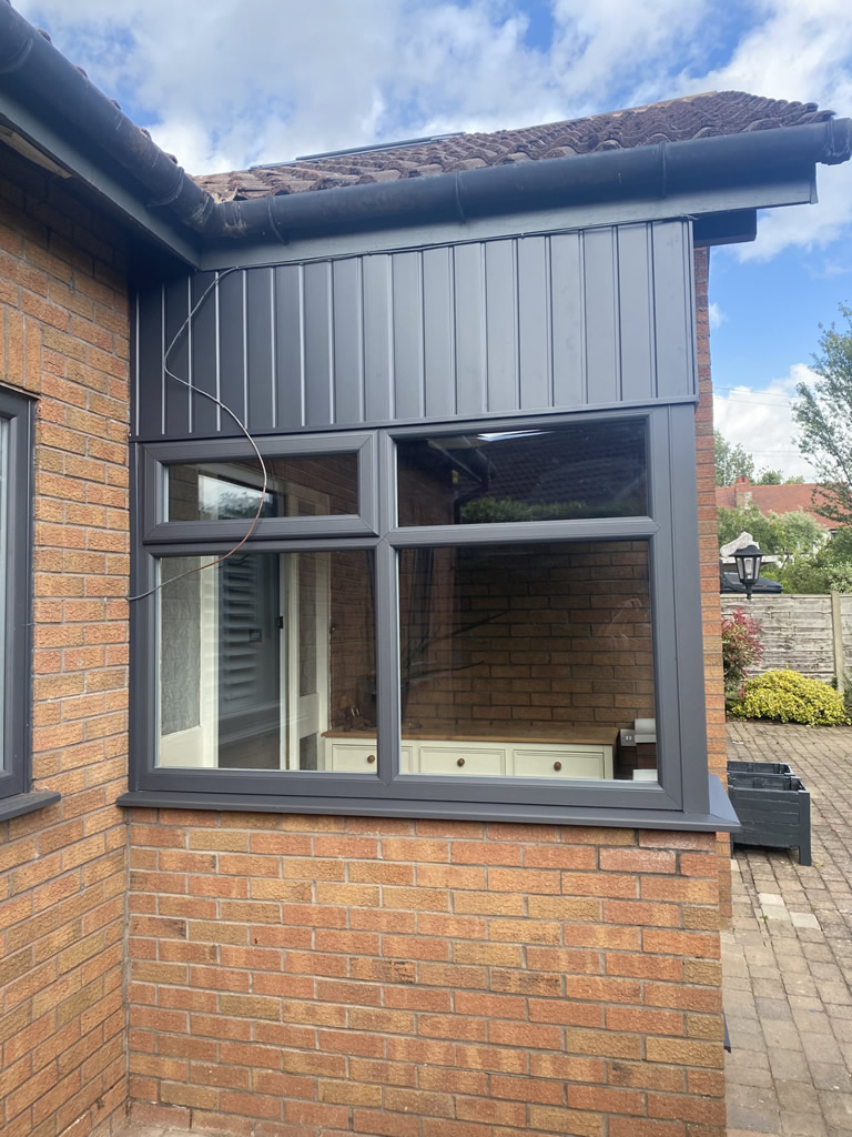 Anthracite Grey Double Glazing & UPVC Cladding Installation Neston 