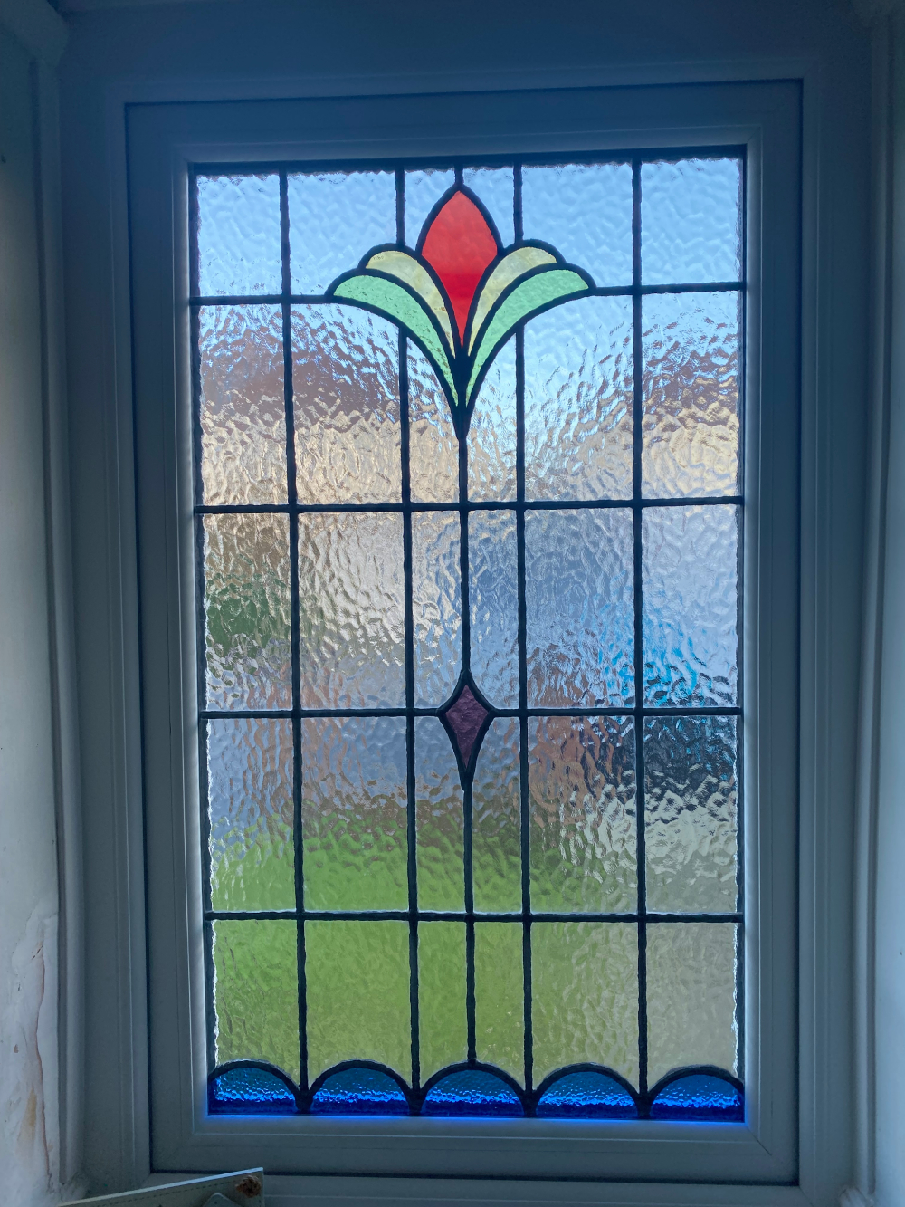 Old Stained Glass Encapsulated into Replacement Windows